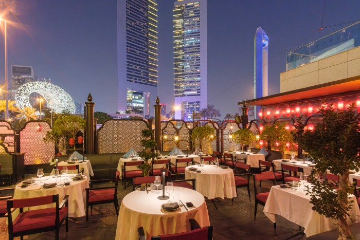 Terrace

set against the stunning backdrop of difc, our outdoor terrace offers breathtaking views of the museum of the future and the iconic emirates towers, creating the perfect ambiance to unwind and dine in style. This smoking-friendly space features thoughtfully separated seating across two distinct areas: an elegant dining section with standard tables and sofas for a relaxed yet sophisticated experience, and an elevated smoking lounge complete with an outdoor bar and dj booth where your hutong journey begins at our welcoming reception. Whether you’re savoring a refreshing drink or enjoying a memorable meal, the terrace provides a luxurious, open-air setting for every occasion, accommodating up to 70 guests for seated dining or up to 120 guests for standing receptions. Enquire now
